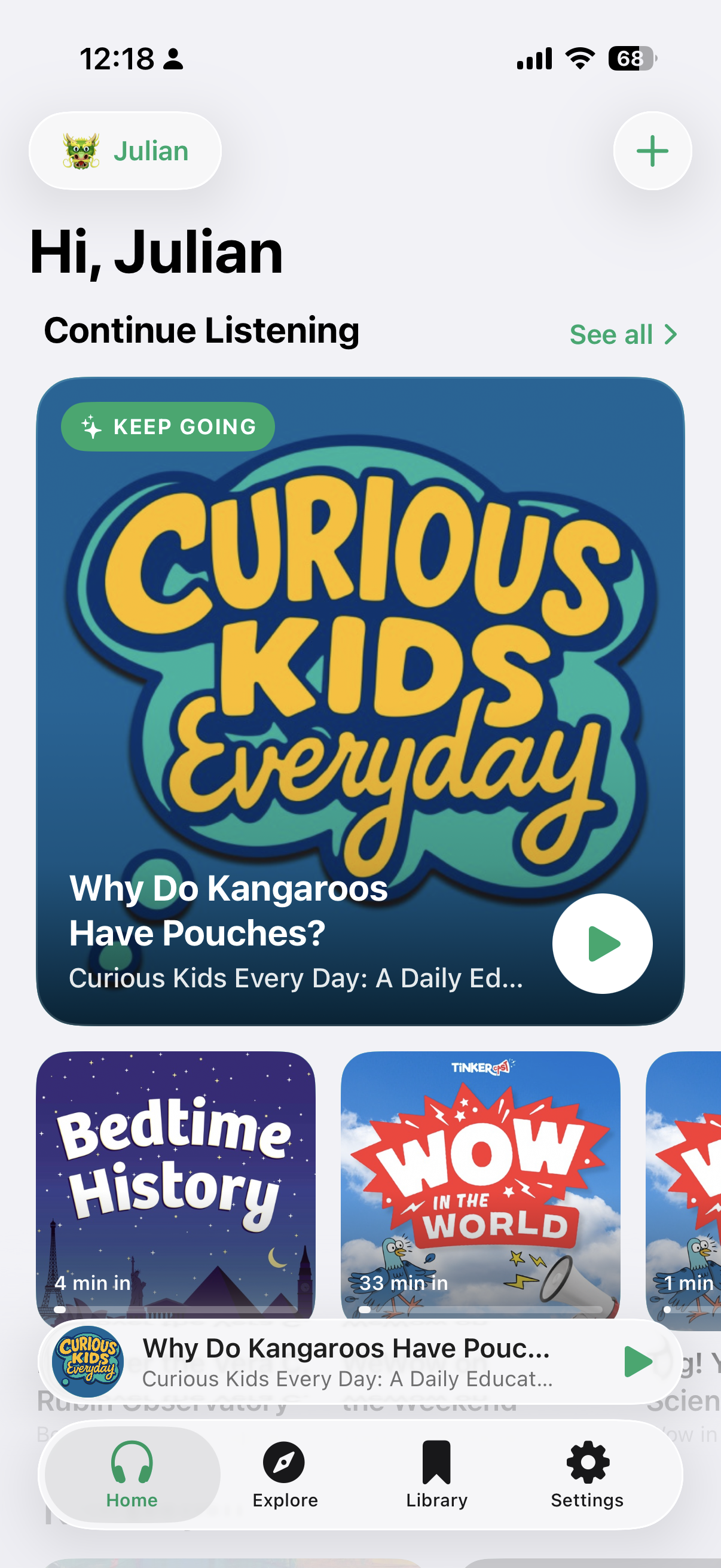 PodFocus kid home screen — 'Hi, Julian' greeting with Continue Listening cards